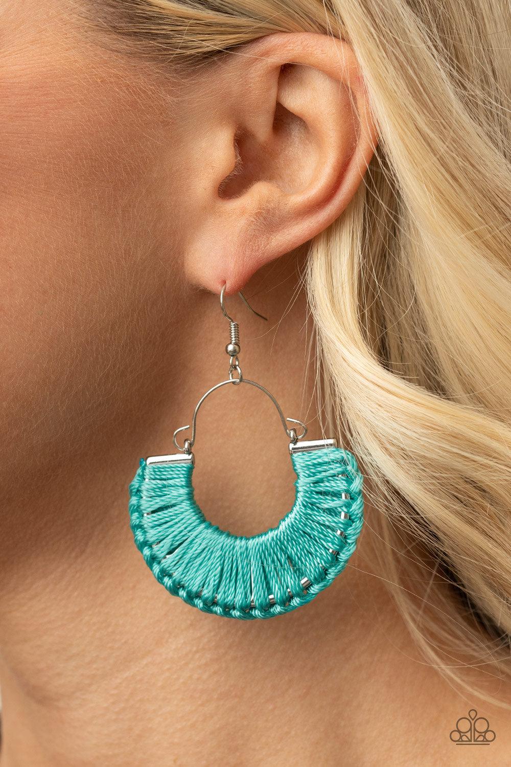 Paparazzi Accessories Threadbare Beauty - Blue Shiny Blue Tint thread wraps and knots around a silver half moon frame, creating a colorful boho frame. Earring attaches to a standard fishhook fitting. Sold as one pair of earrings. Jewelry