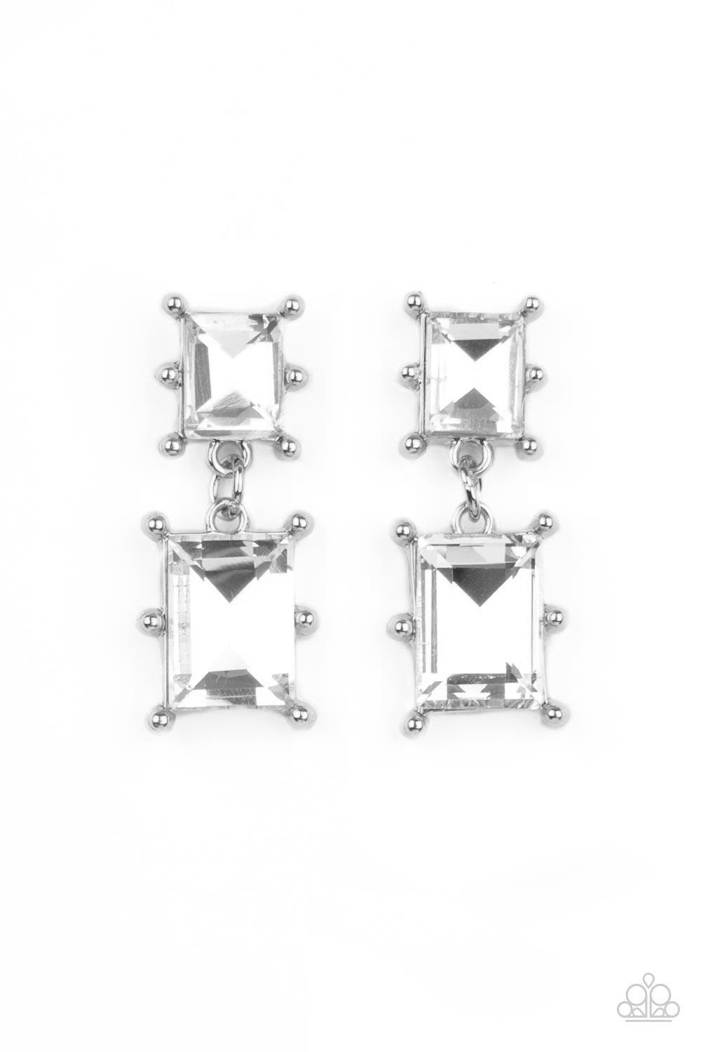 Paparazzi Accessories Cosmic Queen - White Two brilliant baguette cut white rhinestones, set in classic silver pronged settings, stack one over the other creating a cosmically radiant statement. Earring attaches to a standard post fitting. Sold as one pai