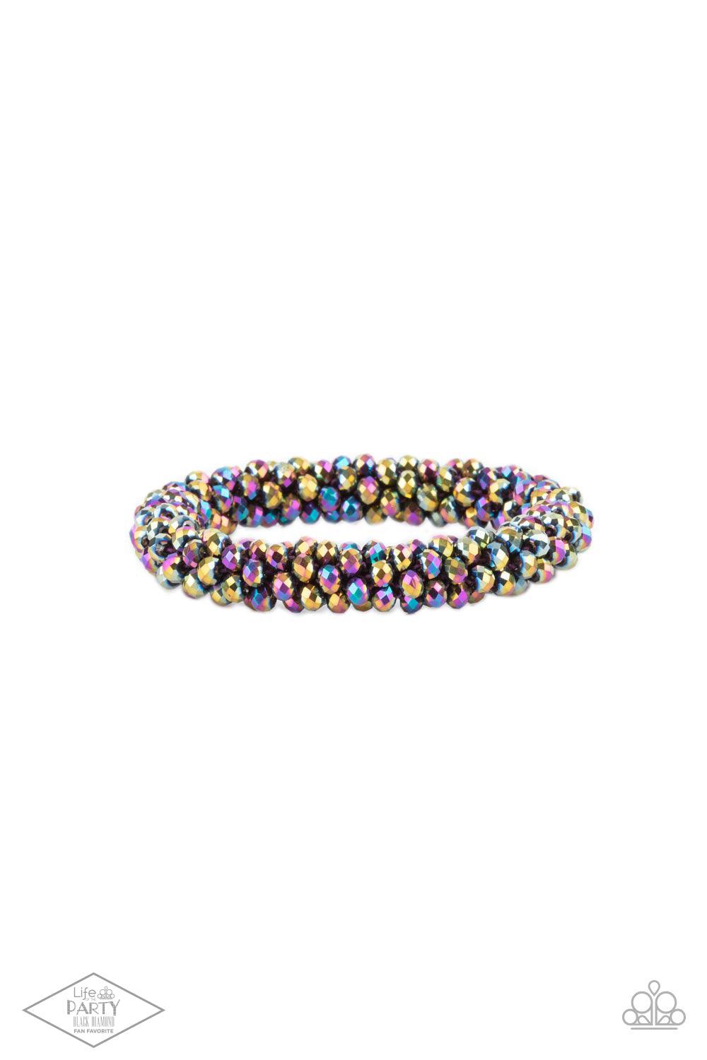 Paparazzi Accessories Wake Up and Sparkle - Multi Sparkling with dramatic brilliance, a collection of faceted dainty oil spill beads are threaded along a woven stretchy band creating a stunning statement around the wrist. Sold as one individual bracelet.