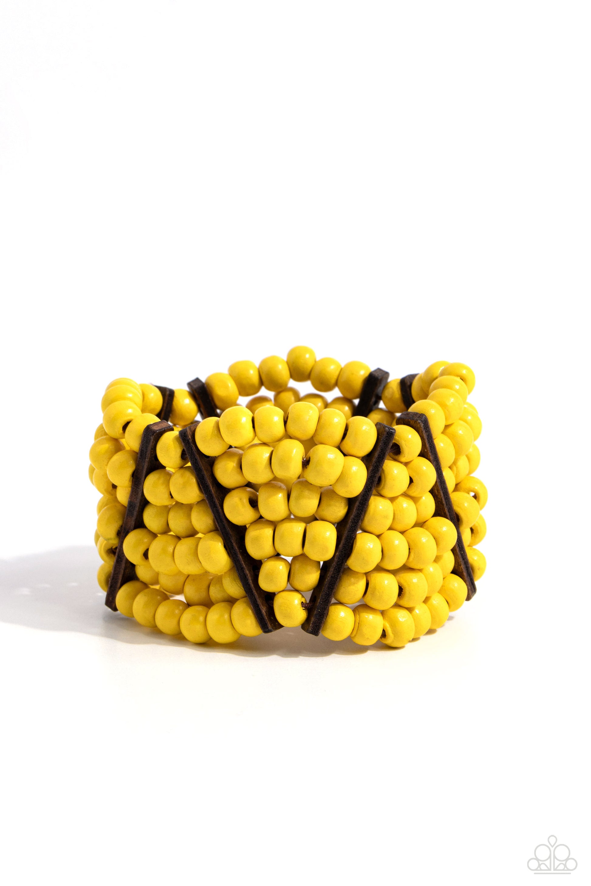 Paparazzi Accessories Way Off TROPIC - Yellow Stacked layers of vibrant yellow round wooden beads are threaded along stretchy bands making a bold statement. Slender wooden bars are woven in on an angle and lean in opposite directions as they work their wa