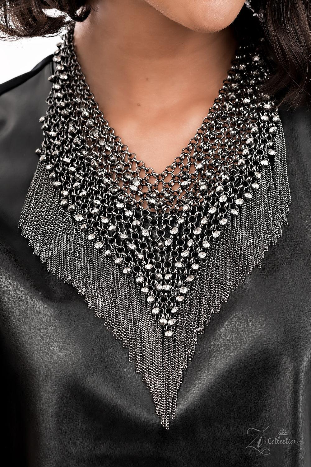 Paparazzi Accessories Impulsive Row after row of blinding white rhinestones trickle from a seemingly infinite collection of bold gunmetal links that interlock into an intensely tapered metallic net down the chest. Gritty gunmetal chains stream from the bo