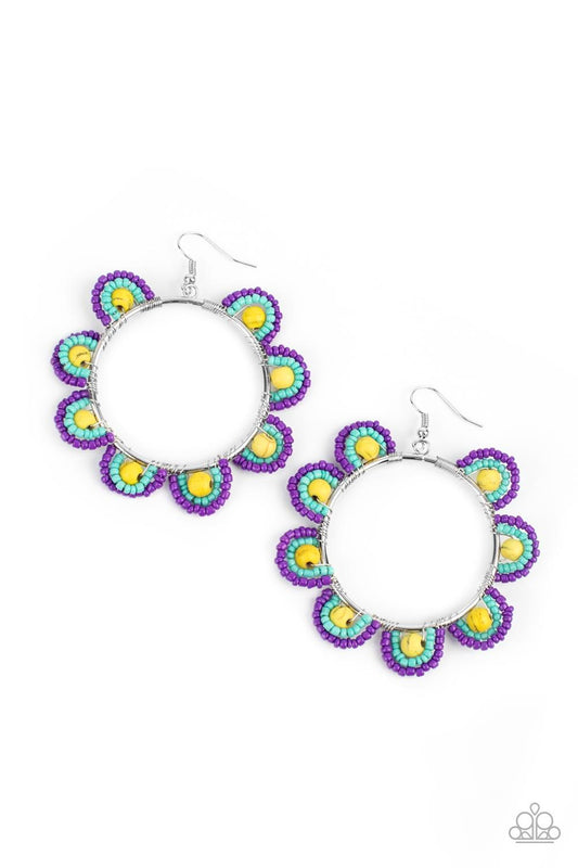 Paparazzi Accessories Groovy Gardens - Yellow Infused with sunny yellow stone bead centers, rows of purple and turquoise seed beads are threaded along dainty wires along the outside of a shiny silver hoop for a vivacious floral look. Earring attaches to a