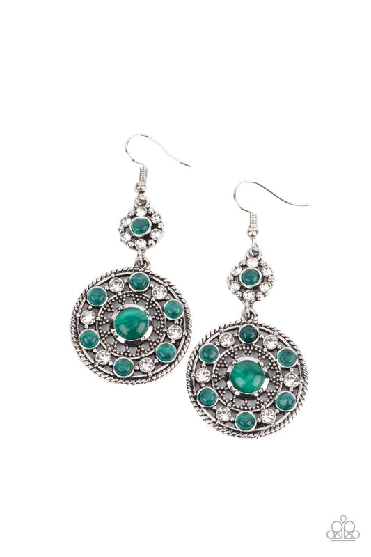Paparazzi Accessories Party at My PALACE - Green A bubbly collection of Leprechaun cat's eye stones and glassy white rhinestones embellish the front of a studded silver frame. The circular frame swings from the bottom of a matching floral fitting, creatin