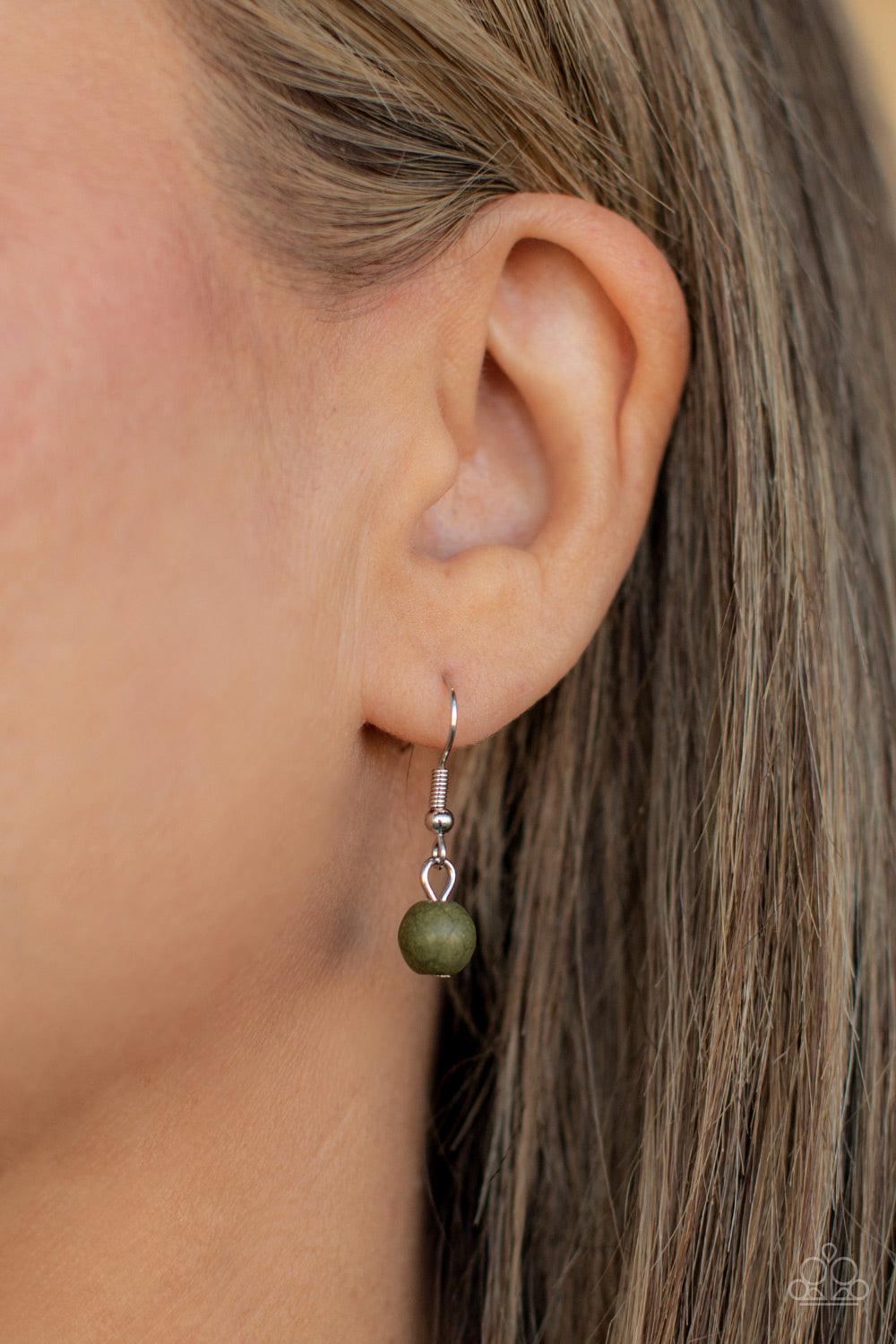 Paparazzi Accessories Sahara Suburb - Green A dainty silver chain is paired with a grounding green stone beaded chain below the collar. An oversized green stone adorns the center of an antiqued silver frame radiating with silver studded and wire-like deta