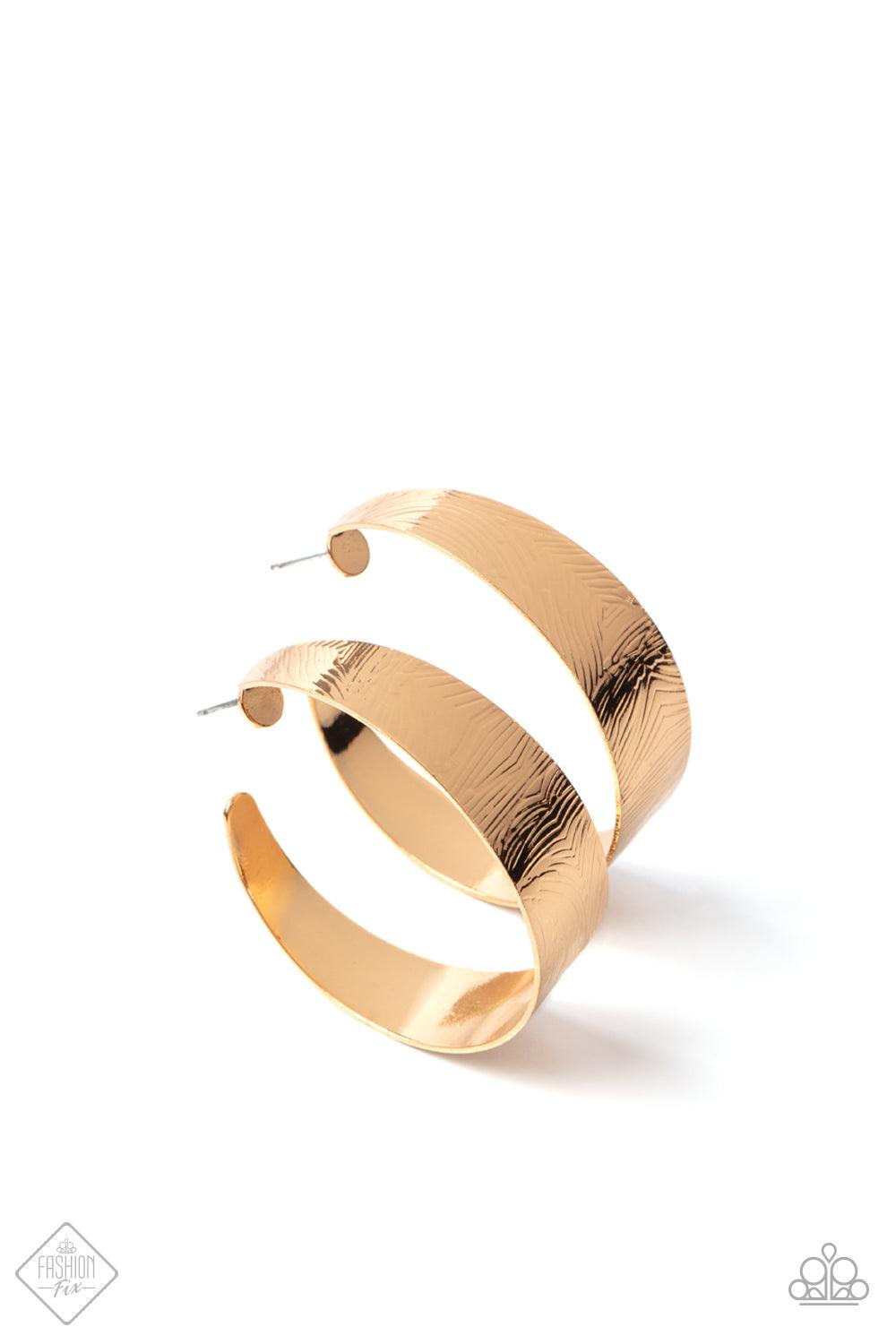 Paparazzi Accessories Curve Crushin - Gold Embossed in whirling geometric details, a thick gold hoop boldly curls around the ear for a curvaceous look. Earring attaches to a standard post fitting. Hoop measures approximately 2" in diameter. Sold as one pa