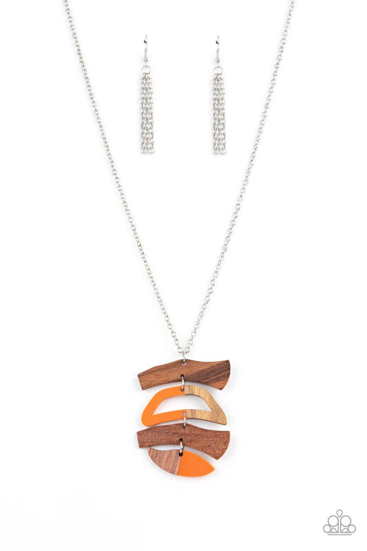 Paparazzi Accessories A WOODWORK In Progress - Orange Featuring orange acrylic accents, mismatched wooden frames delicately link into an abstract pendant at the bottom of a lengthened silver chain for an earthy fashion. Features an adjustable clasp closur