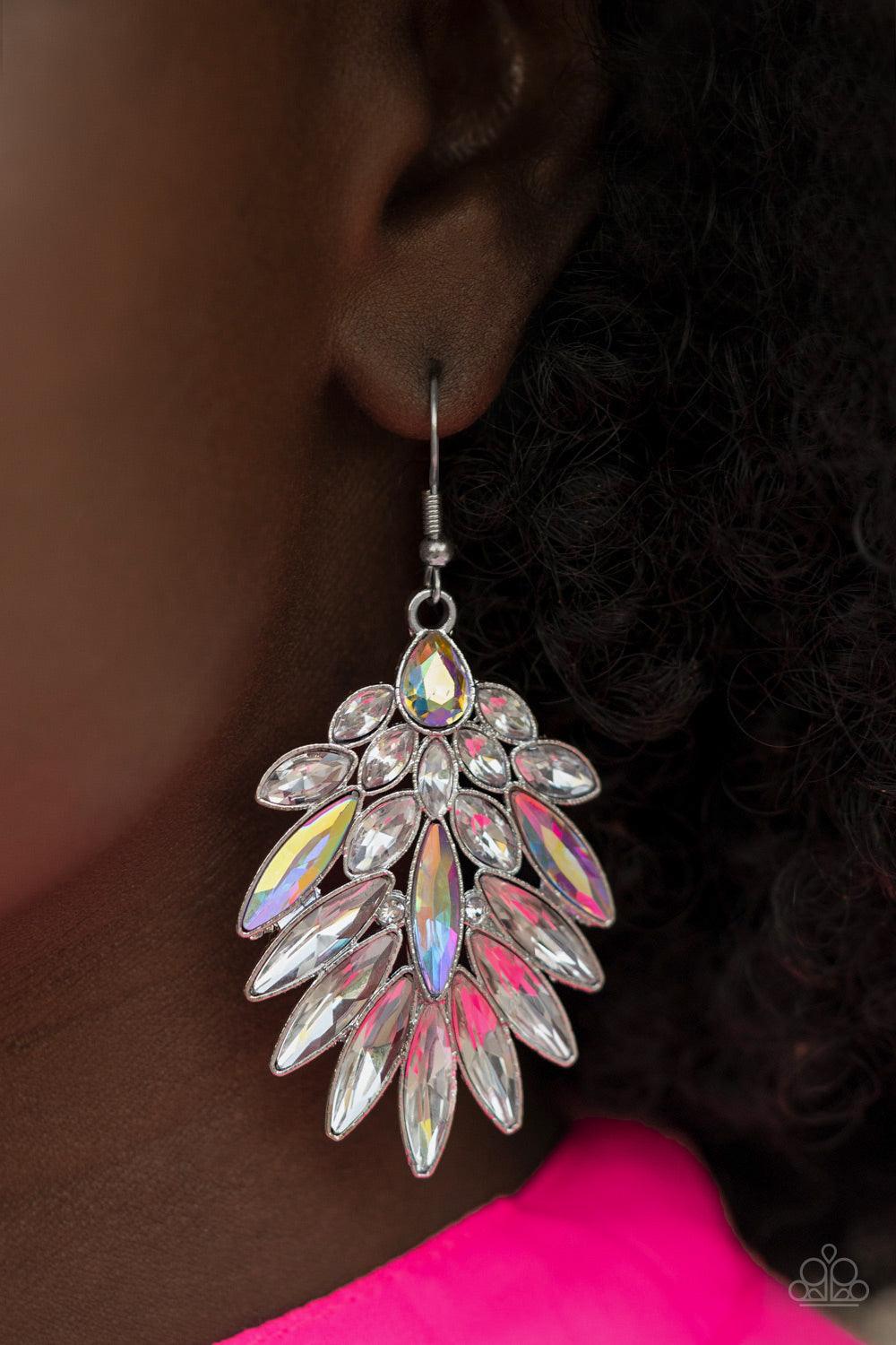 Paparazzi Accessories COSMIC-politan An iridescent/Silver teardrop rhinestone gives way to a sparkly fan of classic white and oblong iridescent marquise cut rhinestones, coalescing into an out-of-this-world statement piece. Earring attaches to a standard