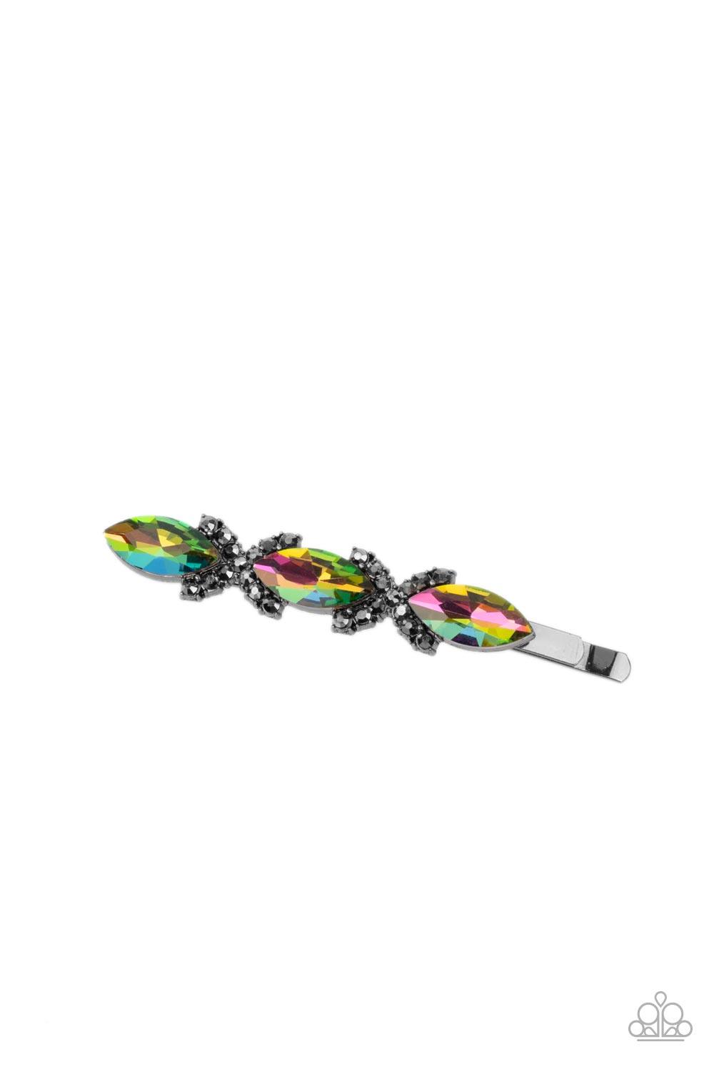 Paparazzi Accessories Stellar Socialite - Multi Crisscrossed ribbons of smoky hematite rhinestones separate a trio of oil spill marquise cut gems across the front of a classic gunmetal bobby pin for a stellar fashion. Sold as one individual decorative bob