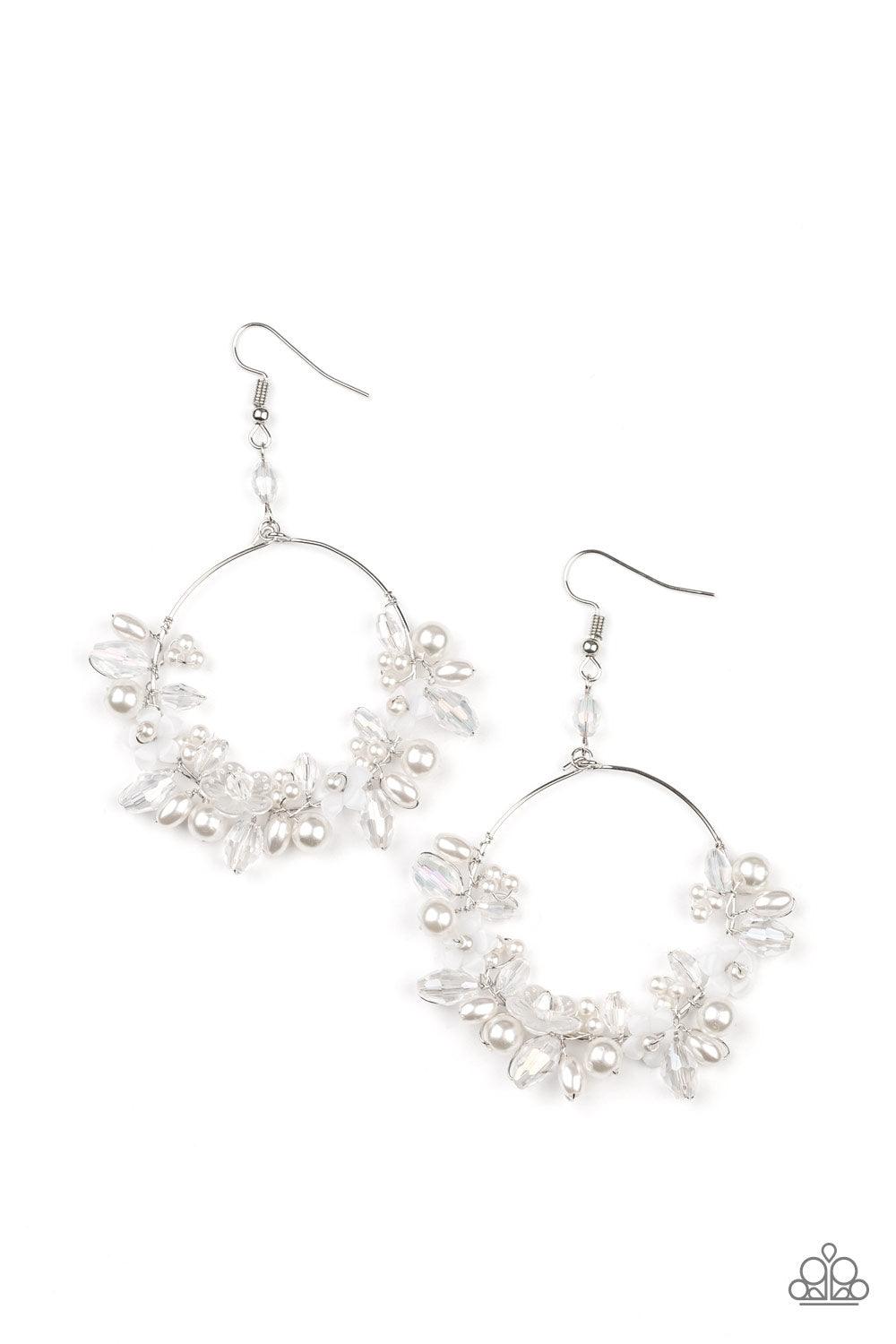 Paparazzi Accessories Floating Gardens - White A timeless collection of iridescent crystal-like accents, dainty white pearls, and white floral frames delicately cluster along the bottom of a silver hoop, creating a glamorous glow. Earring attaches to a st