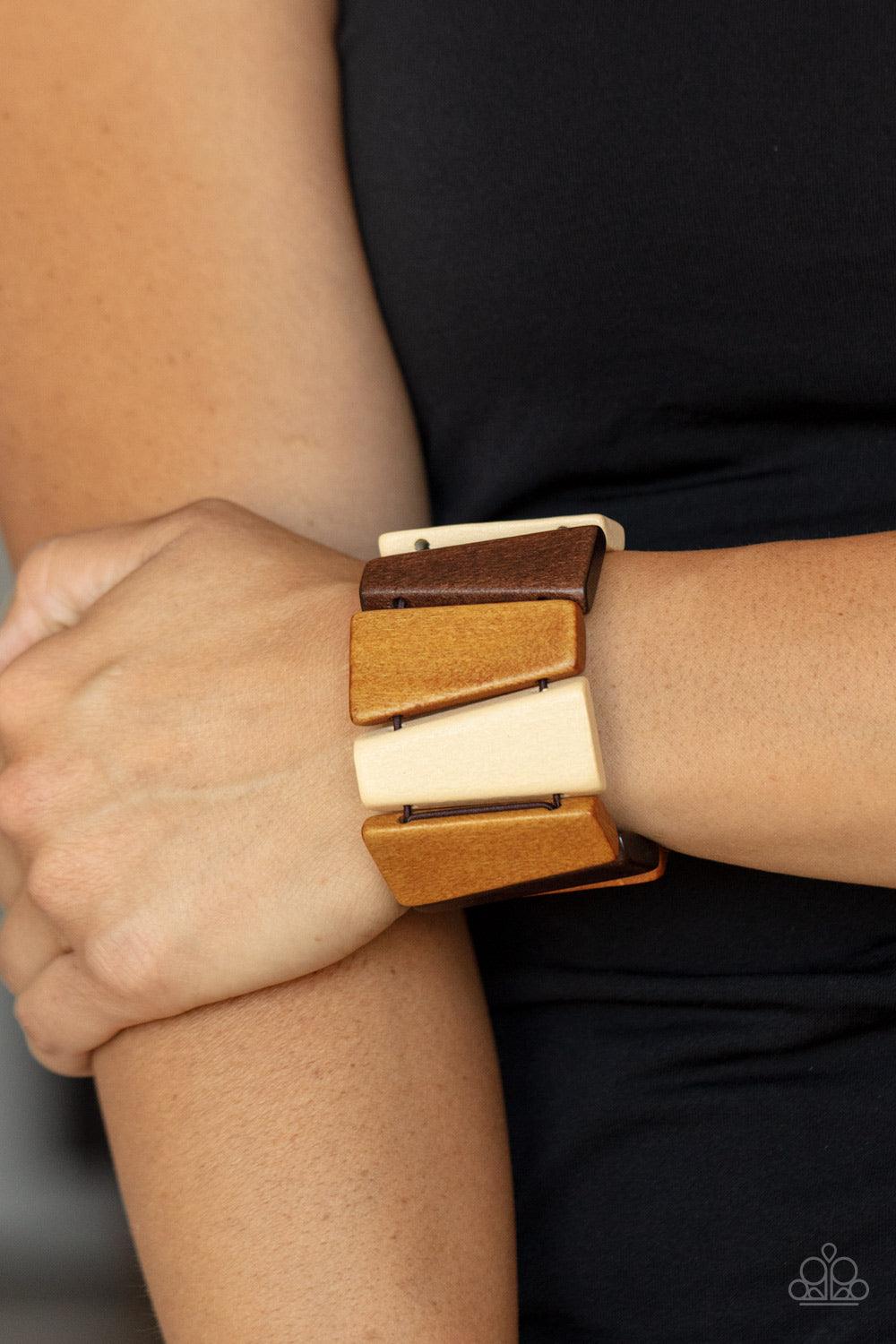 Paparazzi Accessories Barbados Backdrop - Multi Tinted in various shades of brown, chunky triangular wooden frames are threaded along stretchy bands around the wrist for an earthy look. Sold as one individual bracelet. Jewelry