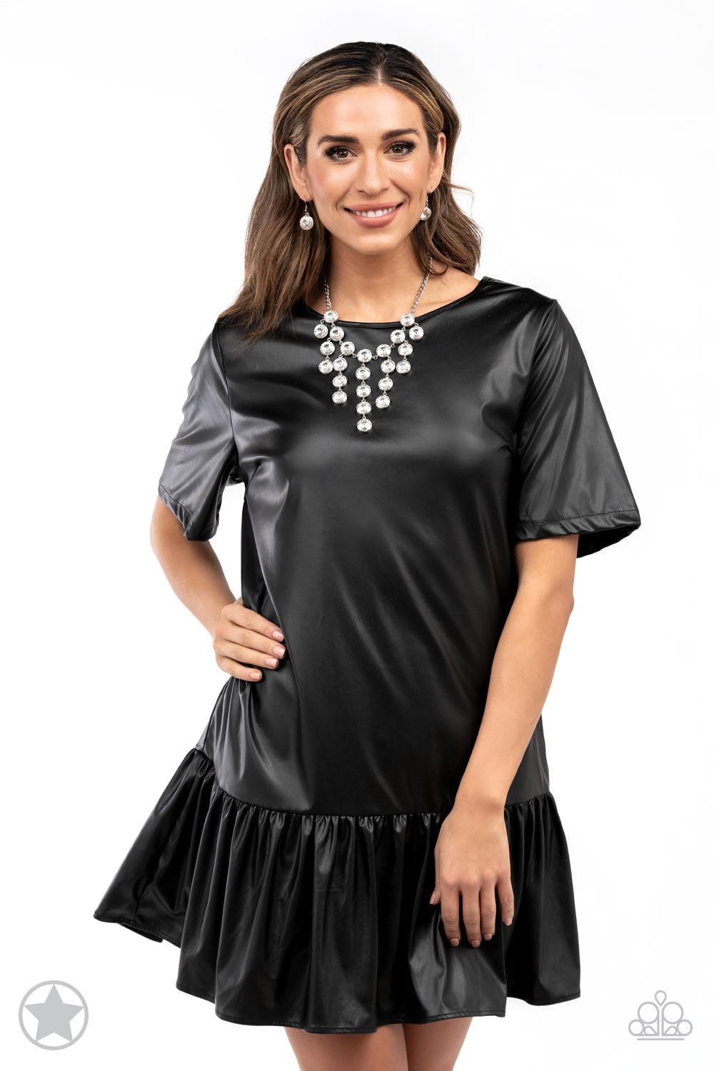 Paparazzi Accessories Spotlight Stunner - White Encased in sleek silver fittings, dramatically oversized white rhinestones delicately link into twinkly tassels that taper off into a jaw-dropping fringe below the collar. Features an adjustable clasp closur