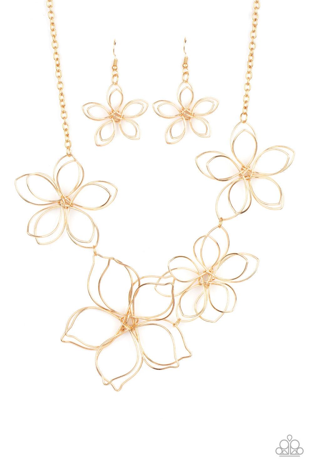 Paparazzi Accessories Flower Garden Fashionista - Gold Shiny gold wire delicately twists into oversized blossoms. Varying in size, the airy floral frames delicately link into an asymmetrical display as the layered frames elegantly pop beneath the collar.