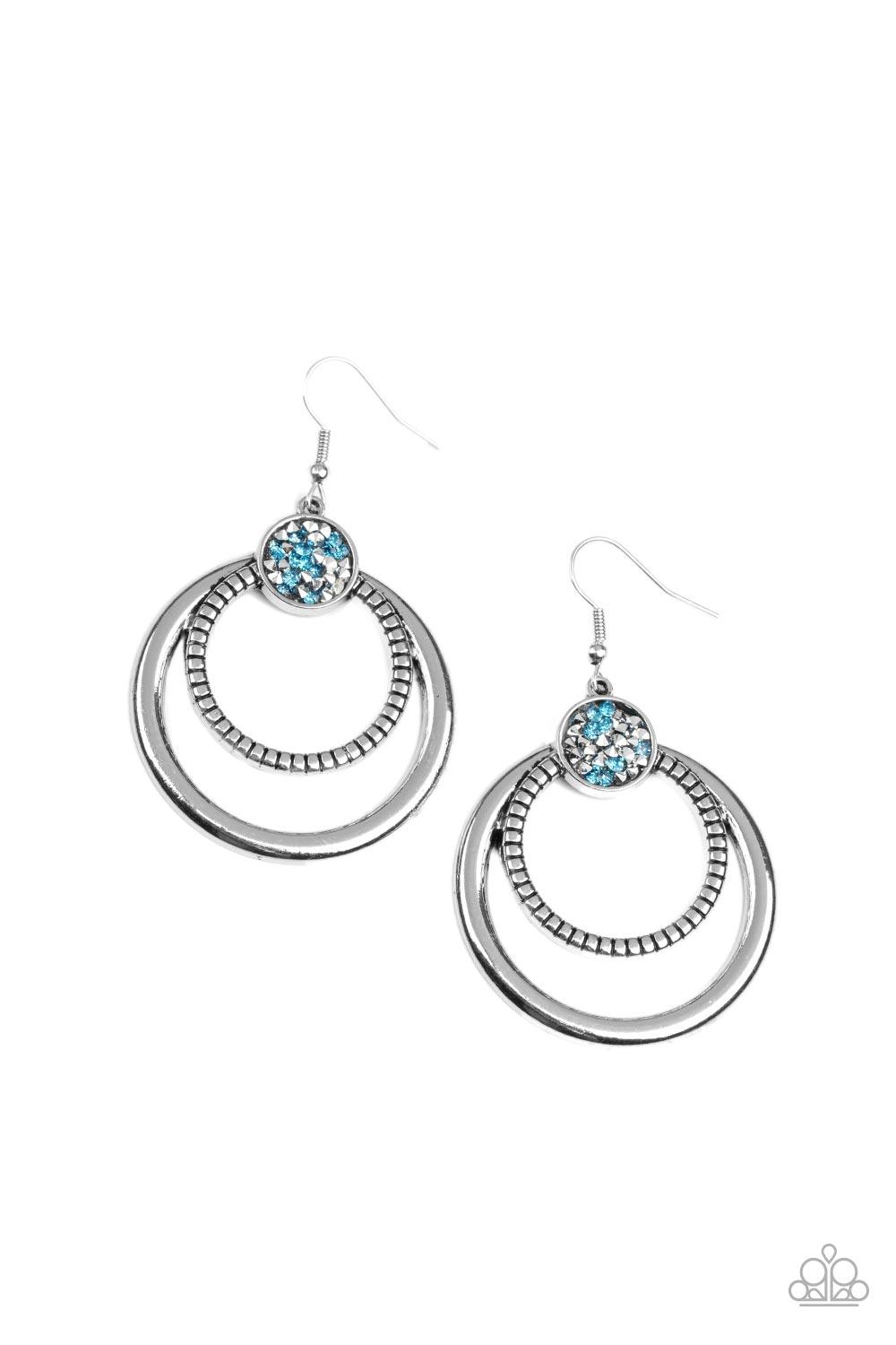 Paparazzi Accessories Spun Out Opulence - Blue Smooth and textured silver hoops connect to the bottom of a silver fitting embellished in glitzy blue and hematite rhinestones, creating a dizzying lure. Earring attaches to a standard fishhook fitting. Sold