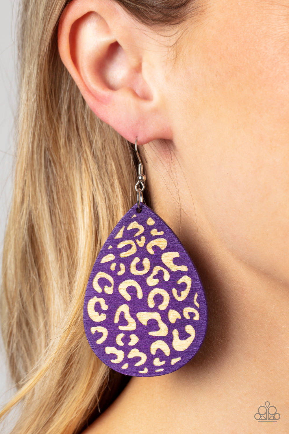 Paparazzi Accessories Suburban Jungle - Purple A purple wooden teardrop frame is etched in a cheetah-like pattern, creating a wildly fabulous fashion. Earring attaches to a standard fishhook fitting. Sold as one pair of earrings. Jewelry