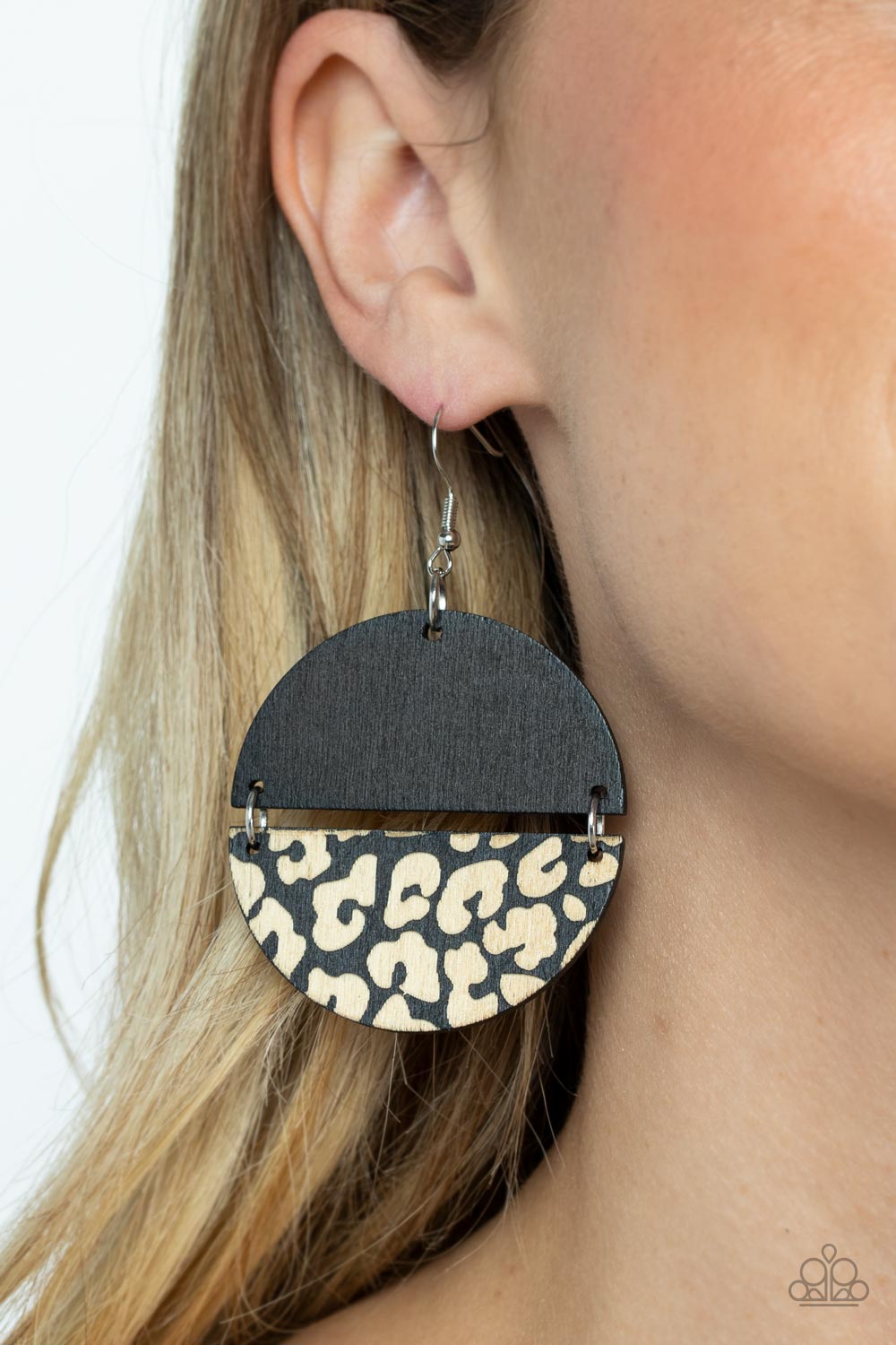 Paparazzi Accessories Jungle Catwalk - Black A plain black half moon wooden frame links with a matching wooden frame that has been etched in a cheetah-like pattern, creating a wild lure. Earring attaches to a standard fishhook fitting. Sold as one pair of