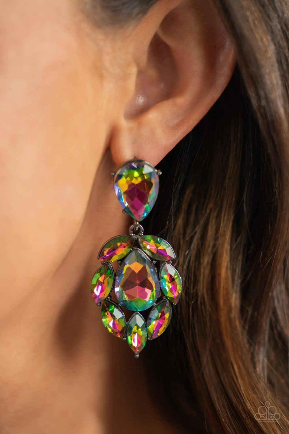 Paparazzi Accessories Galactic Go-Getter - Multi A stellar collection of marquise cut oil spill rhinestones nestle around an oversized teardrop oil spill rhinestone, creating a dramatically stellar display at the bottom of a matching oil spill teardrop rh