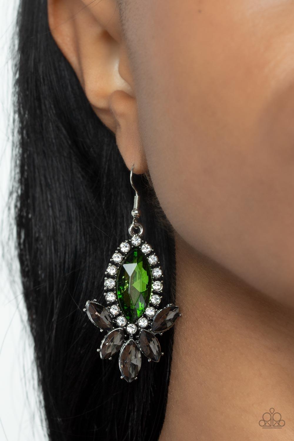Paparazzi Accessories Serving Up Sparkle - Green A fan of smoky marquise cut rhinestones flares out from the bottom of an oversized green marquise cut rhinestone that is bordered in dainty white rhinestones, resulting in a dramatically dazzling display. E