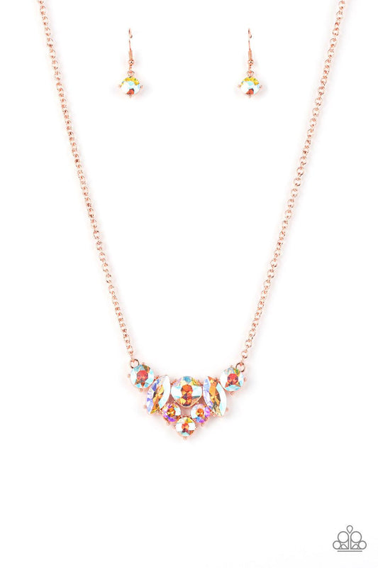 Paparazzi Accessories Lavishly Loaded - Copper A glittering collection of marquise and round peach-colored gems encased in studded copper fittings, coalesce into a lavish frame that gives way to a classic shiny copper chain resulting in a glamorous finish