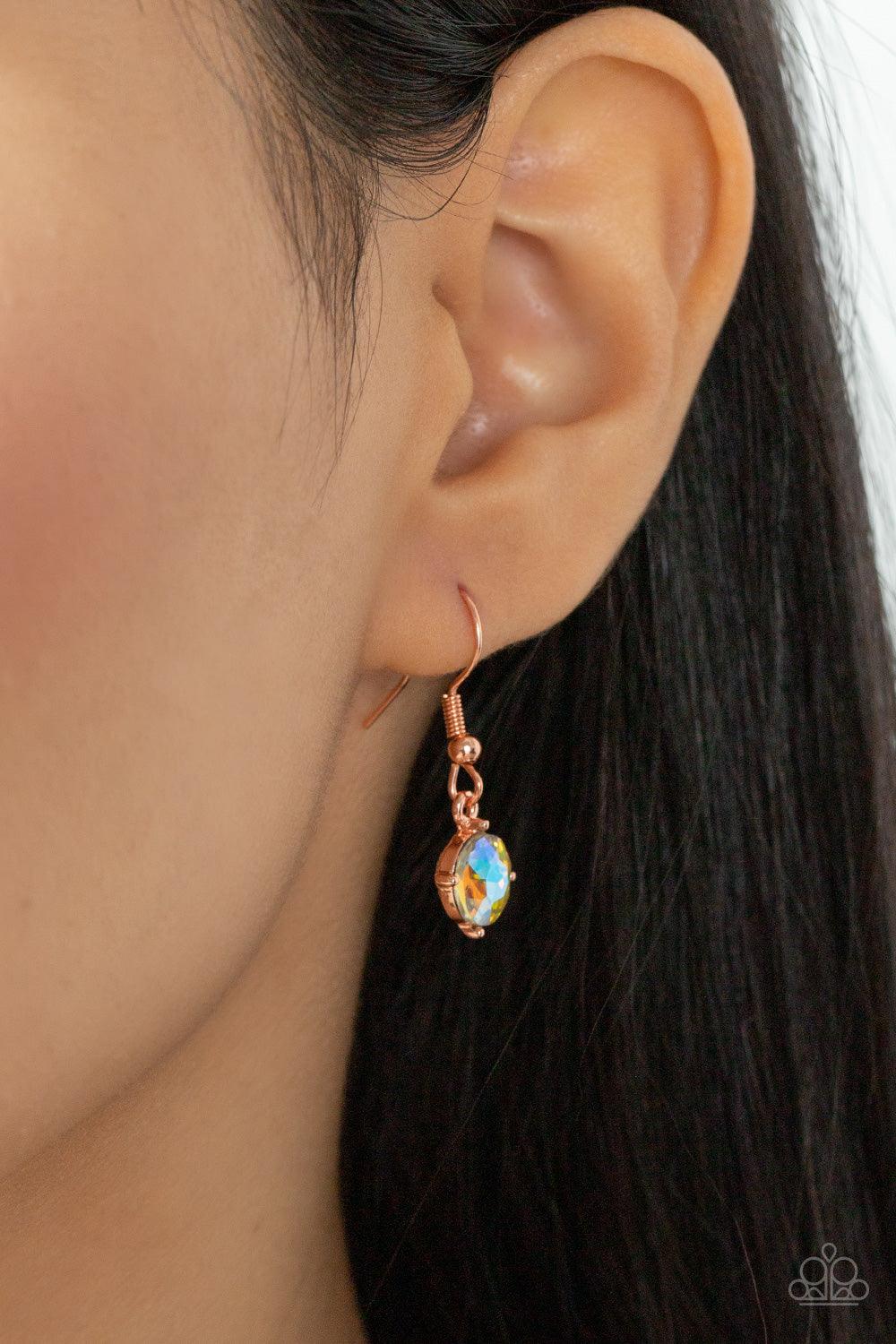 Paparazzi Accessories Lavishly Loaded - Copper A glittering collection of marquise and round peach-colored gems encased in studded copper fittings, coalesce into a lavish frame that gives way to a classic shiny copper chain resulting in a glamorous finish