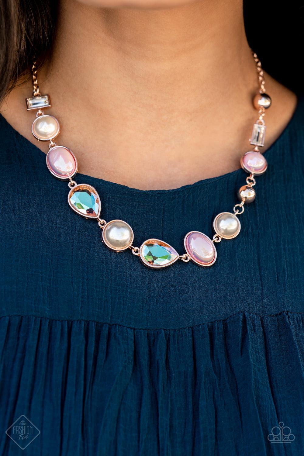 Paparazzi Accessories Nautical Nirvana - Rose Gold A collection of classic white pearls, Pale Rosette pearls glazed in a reflective finish, and iridescent teardrops dance along the collar in an ethereal display. Rose gold frames encase each bead, adding a
