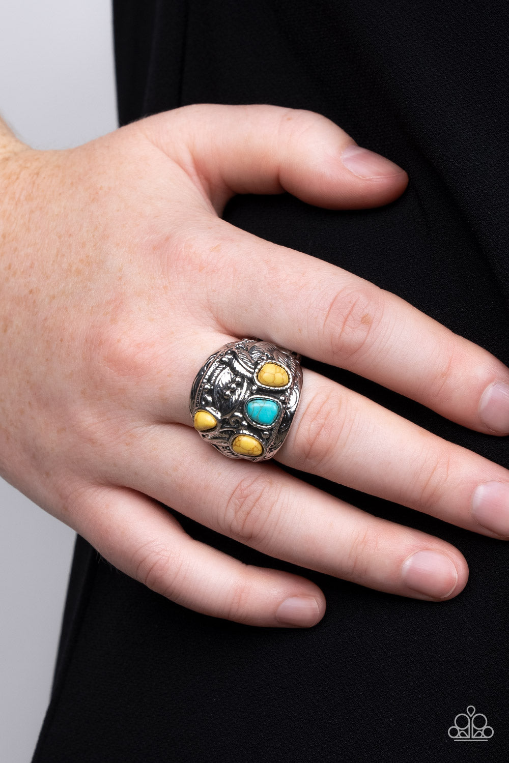 Paparazzi Accessories Down-To-Earth Detail - Yellow An asymmetrical collection of yellow and turquoise stones are scattered across the front of a textured silver frame adorned in feathery and studded details, resulting in an earthy centerpiece atop the fi