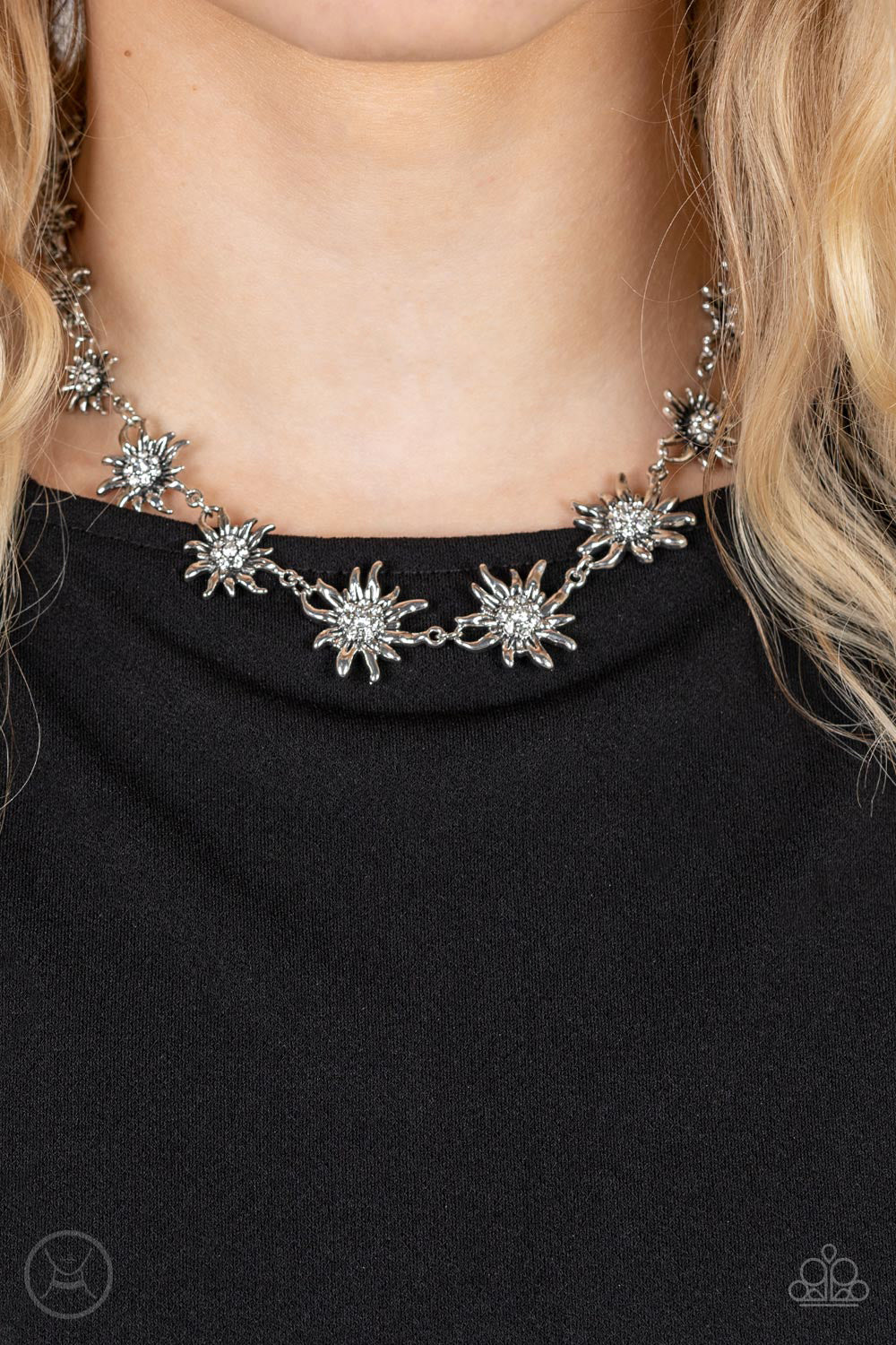 Paparazzi Accessories Get Up and GROW - White Featuring studded silver or white rhinestone encrusted centers, lifelike silver daisies gradually increase in size as they link around the necklace for a fashionably floral display. Features an adjustable clas