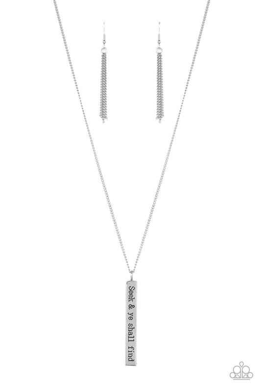 Paparazzi Accessories Matt 7:7 - Silver A flattened rectangular pendant is stamped in the biblical phrase, "Seek & ye shall find. Matt7:7," creating an inspirational sight at the bottom of an extended silver chain. Features an adjustable clasp closure. So