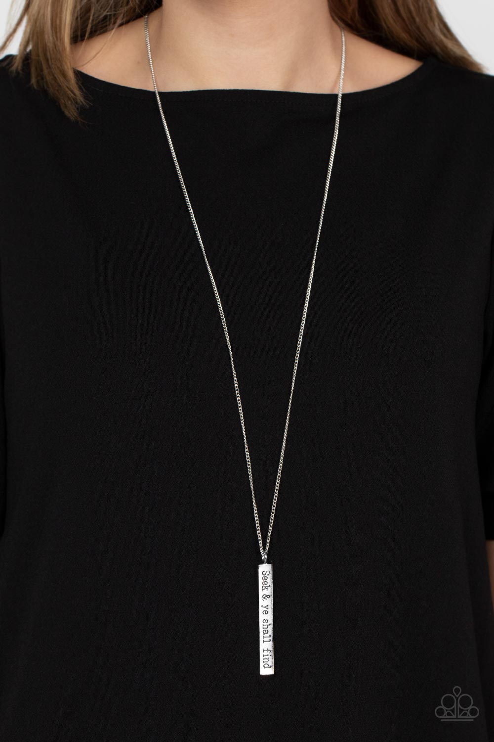 Paparazzi Accessories Matt 7:7 - Silver A flattened rectangular pendant is stamped in the biblical phrase, "Seek & ye shall find. Matt7:7," creating an inspirational sight at the bottom of an extended silver chain. Features an adjustable clasp closure. So