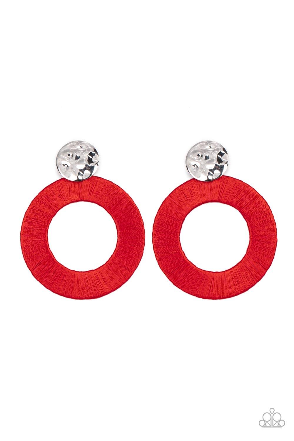 Paparazzi Accessories Strategically Sassy - Red A hammered silver disc gives way to an oversized metal hoop wrapped in fiery red thread, resulting in a modern lure. Earring attaches to a standard post fitting. Sold as one pair of post earrings. Jewelry