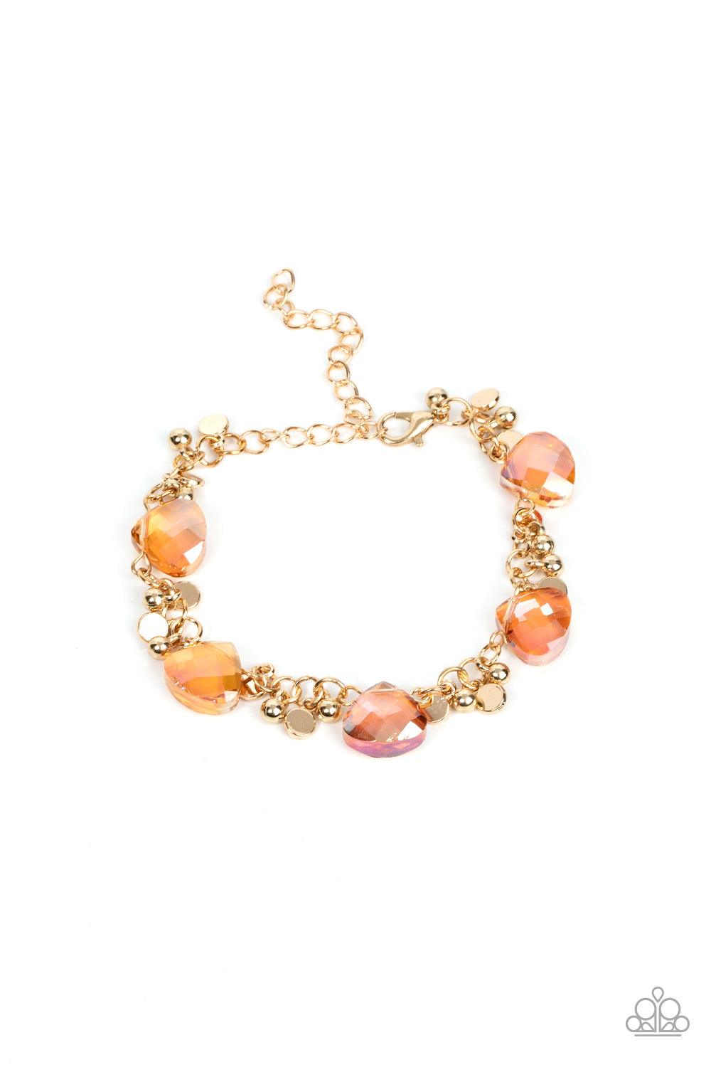 Paparazzi Accessories Super Nova Nouveau - Gold Dainty clusters of gold beads and gold discs connect with Iridescent gold gems around the wrist, resulting in a stellar fringe. Features an adjustable clasp closure. Sold as one individual bracelet. Get The