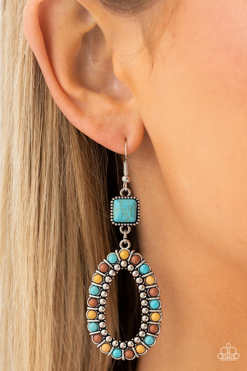 Paparazzi Accessories Napa Valley Luxe - Multi A turquoise stone, chiseled into a polished square, gives way to a silver studded hoop bordered in dainty turquoise, brown, and yellow stones, creating a rustically scalloped lure. Earring attaches to a stand
