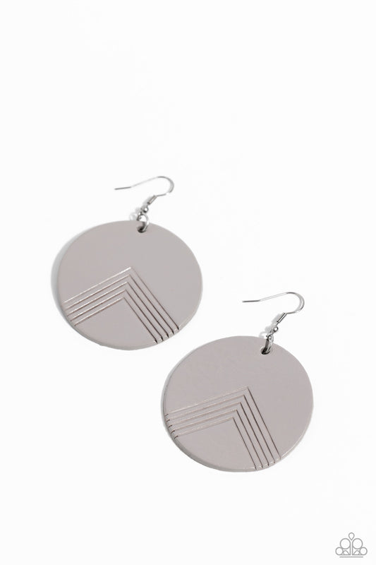 Paparazzi Accessories On the Edge of Edgy - Silver An Ultimate Gray leather disc is etched in an angular geometric accent, creating a modern look. Earring attaches to a standard fishhook fitting. Sold as one pair of earrings. Jewelry
