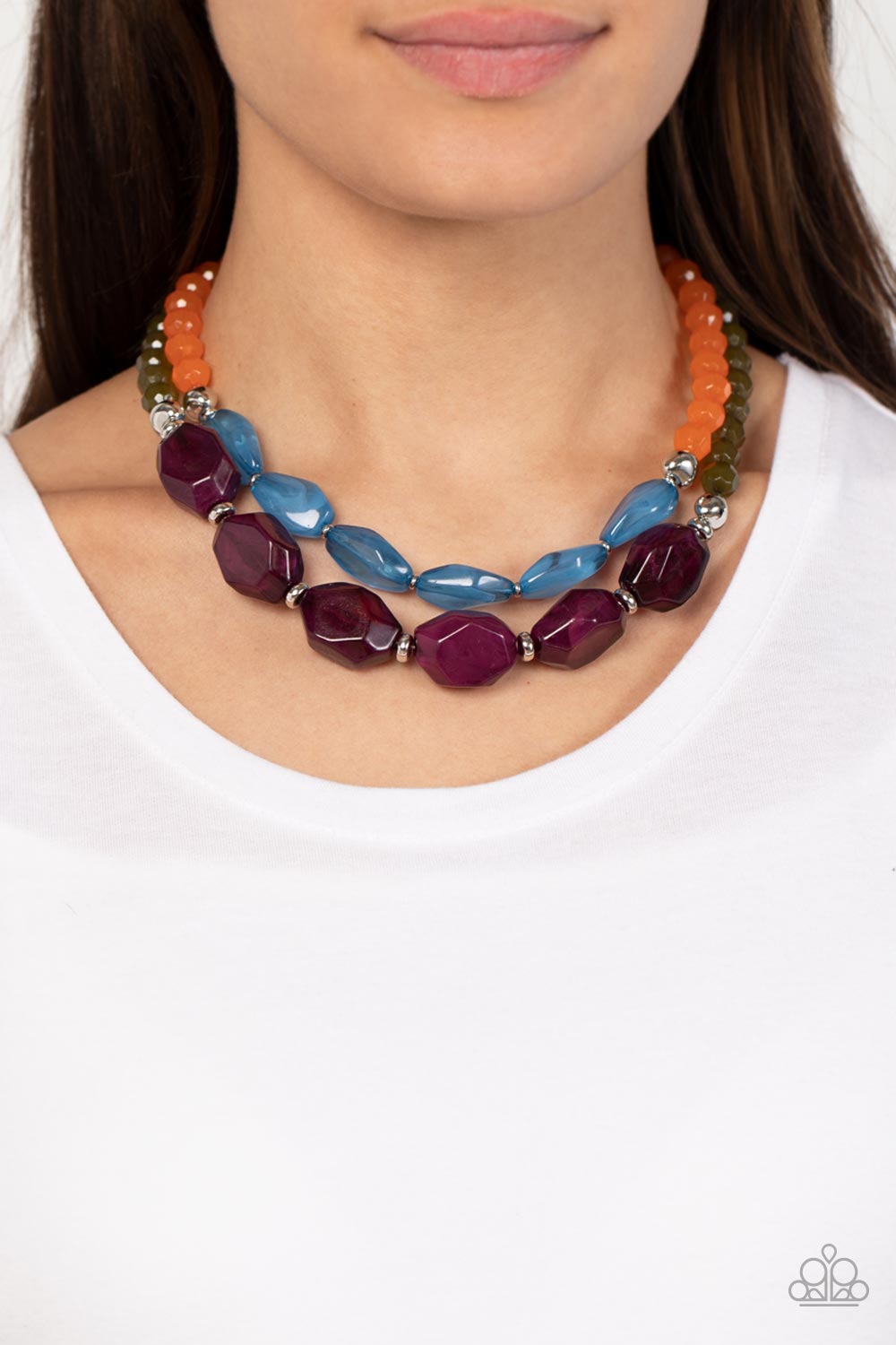 Paparazzi Accessories Tropical Trove - Purple Faceted strands of opaque orange and Olive Branch crystal-like beads give way to a colorful assortment of oversized blue and plum crystal-like accents. Shiny silver beads adorn the hearty layers, adding a dash