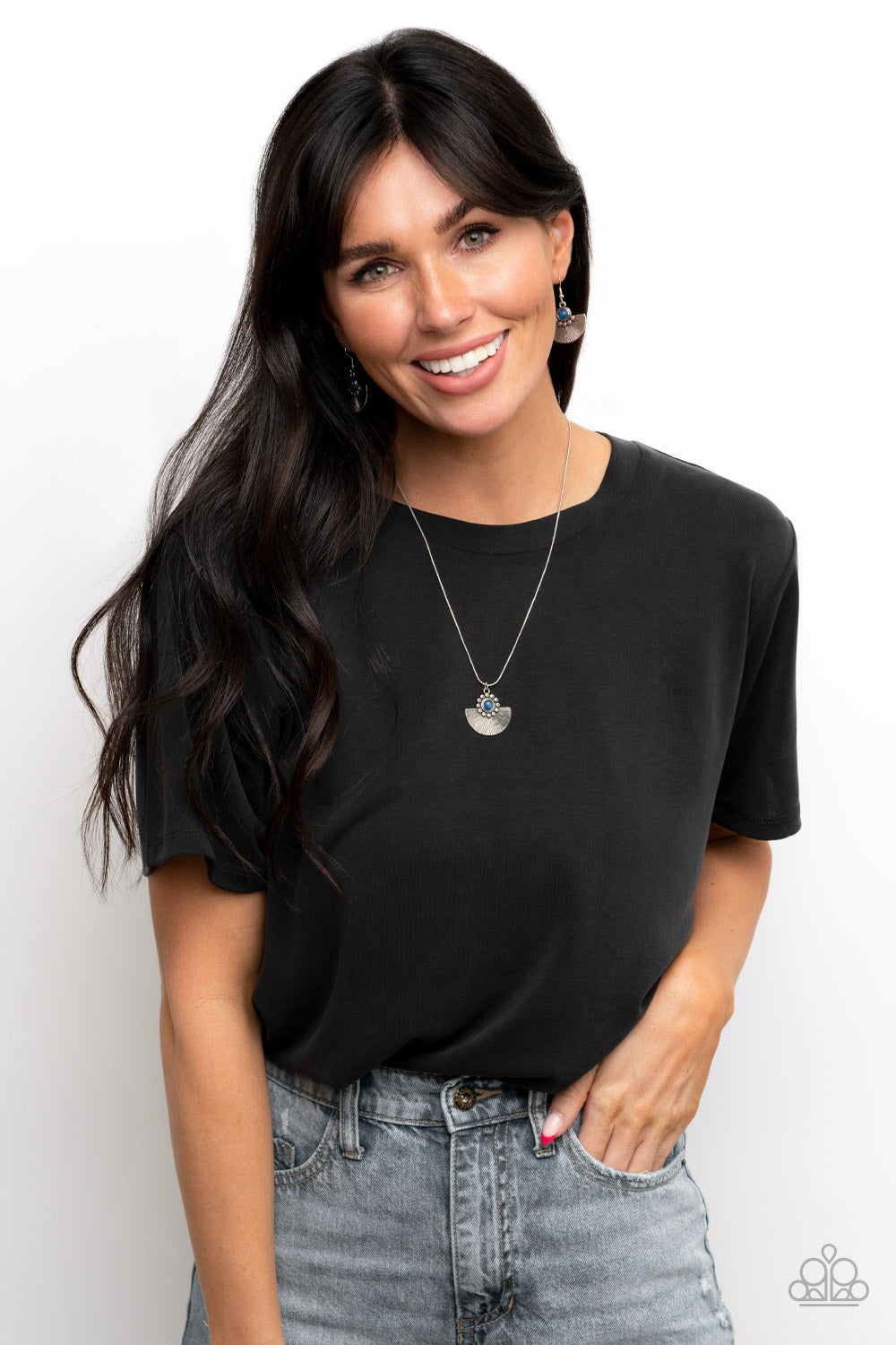 Paparazzi Accessories Magnificent Manifestation - Blue Bordered in a ring of flat silver studs, a mystical blue bead adorns the top of a textured silver half moon pendant that glides along a rounded silver snake chain for an ethereal fashion. Features an