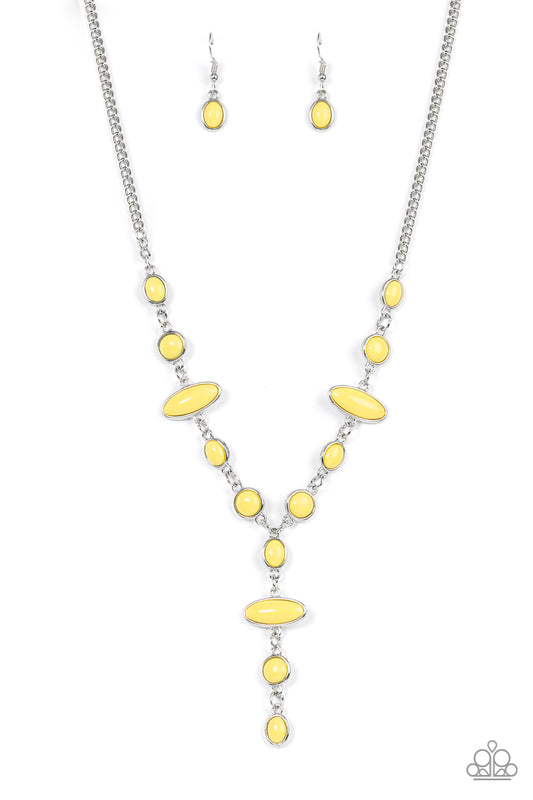 Paparazzi Accessories Authentically Adventurous - Yellow Encased in sleek silver frames, bubbly yellow oval and round beads link into a colorful display, resulting in a playful extended pendant below the collar. Features an adjustable clasp closure. Sold