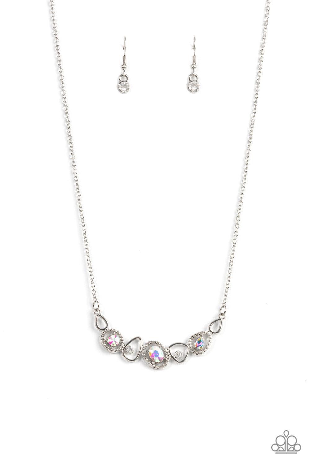 Paparazzi Accessories Celestial Cadence - Multi An incandescent assortment of shiny silver frames, dainty white rhinestones, and oversized iridescent gems delicately coalesce into a statement-making sparkle below the collar. Features an adjustable clasp c