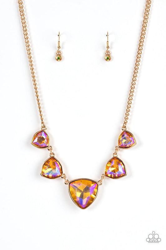 Paparazzi Accessories Cosmic Constellations - Gold Encased in sleek gold fittings, an oversized collection of UV geometric gems gradually increase in size as they link below the collar for a golden statement. Features an adjustable clasp closure. Sold as