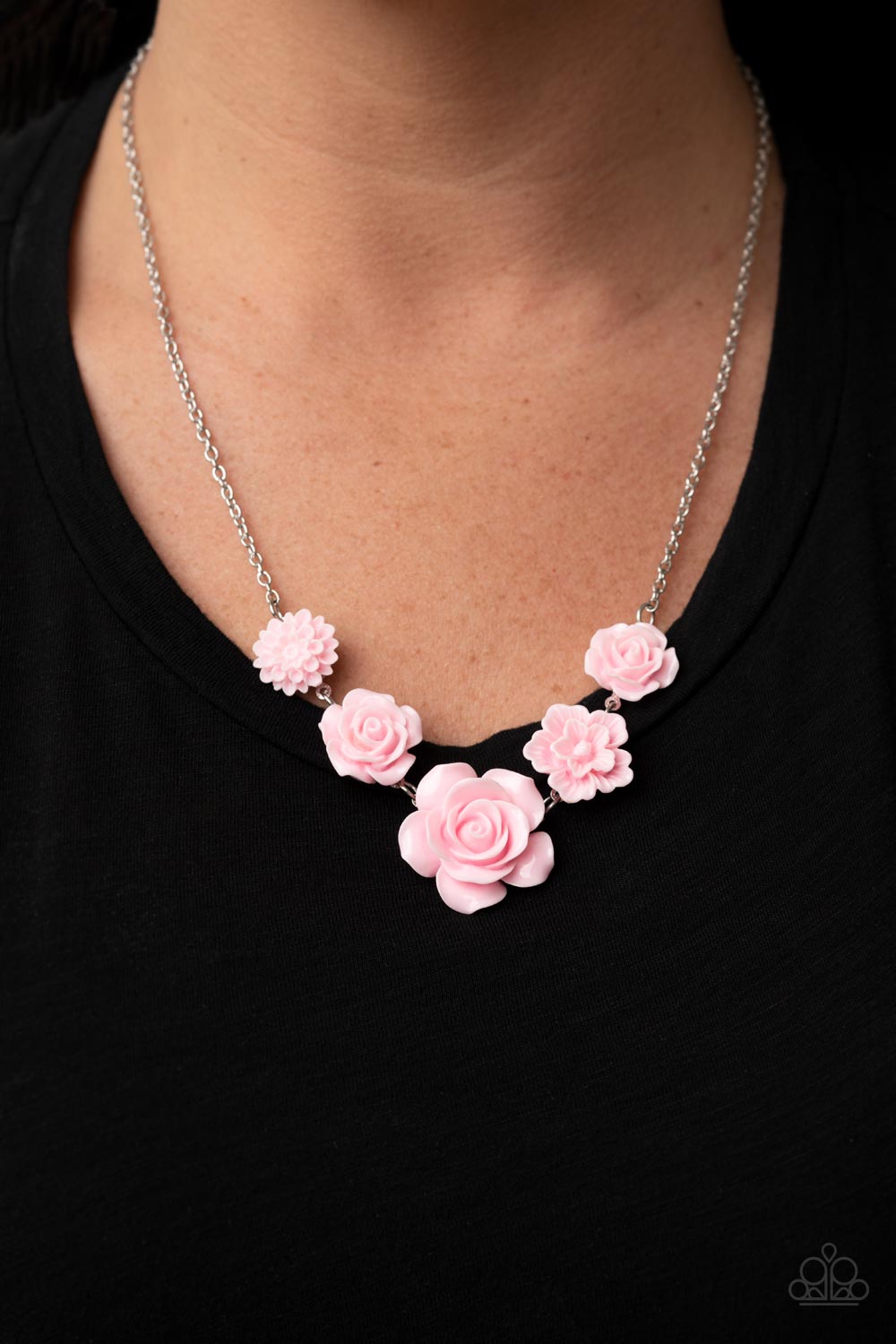 Paparazzi Accessories PRIMROSE and Pretty - Pink A dainty collection of primrose and floral Pale Rosette frames delicately connect below the collar, blooming into a seasonal centerpiece. Features an adjustable clasp closure. Sold as one individual necklac