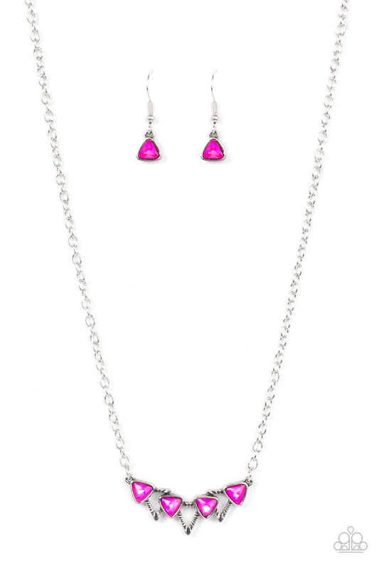 Paparazzi Accessories Pyramid Prowl - Pink A staggered row of iridescent pink triangular gems stack across the front of a row of textured silver triangular frames, resulting in a stellar sparkle below the collar. Features an adjustable clasp closure. Sold