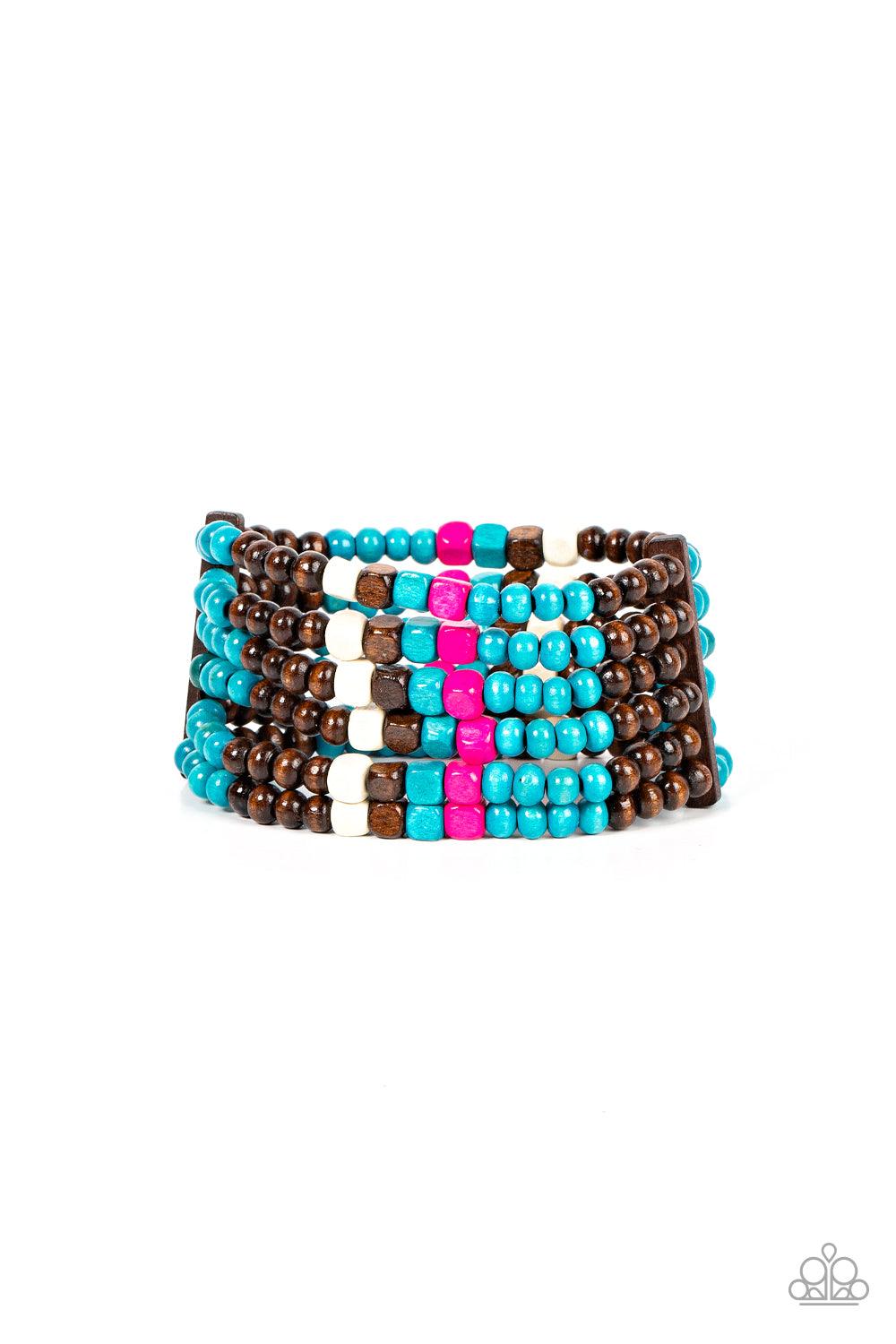 Paparazzi Accessories Dive into Maldives - Blue Held together with rectangular wooden frames, a colorful collection of blue, brown, white, and Fuchsia Fedora cube and round wooden beads are threaded along stretchy bands around the wrist for a splash of tr