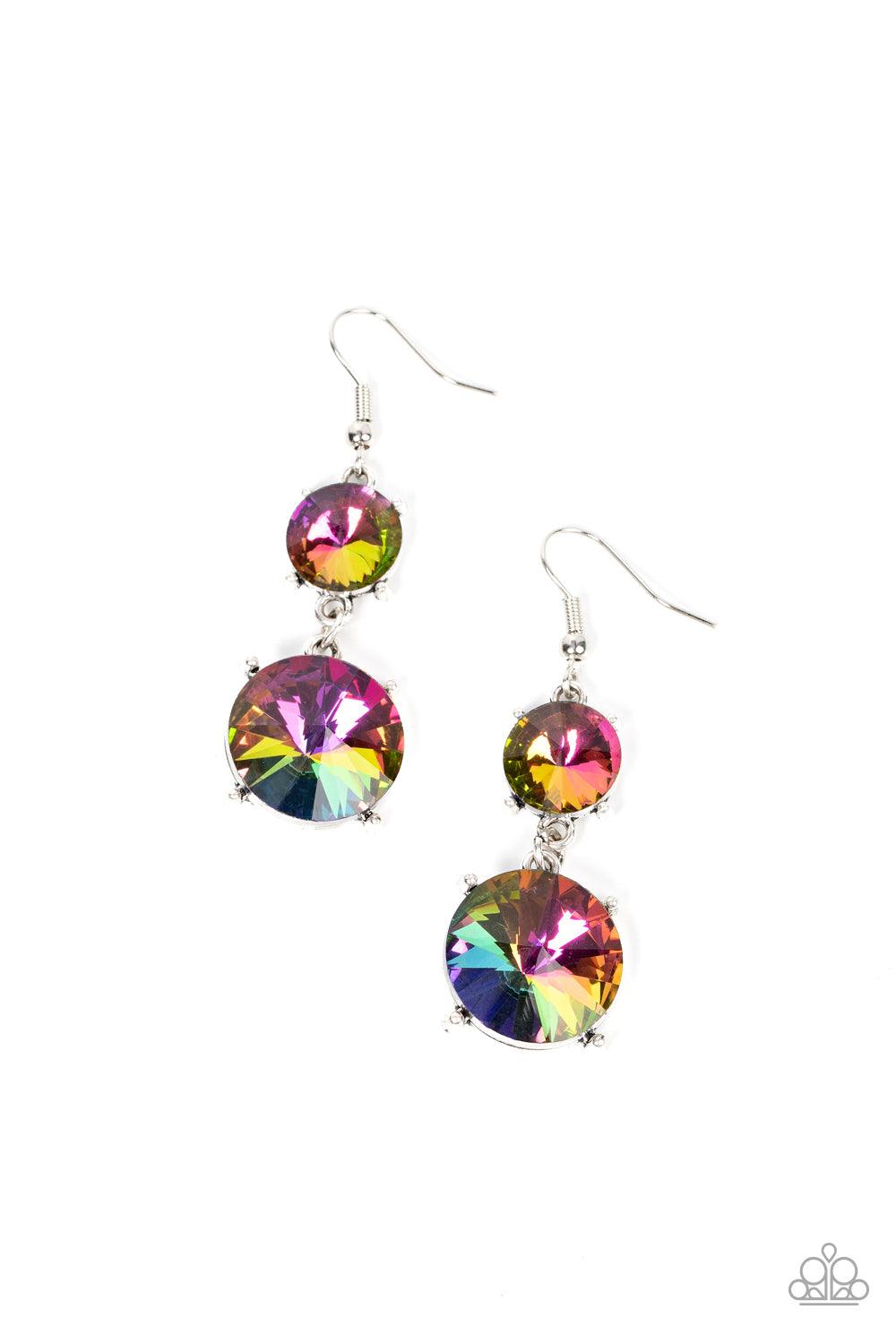 Paparazzi Accessories Sizzling Showcase - Multi Featuring pronged silver fittings, two oversized oil spill rhinestones dramatically link into a bold smoldering lure as they drip dazzlingly from the ear. Earring attaches to a standard fishhook fitting. Sol