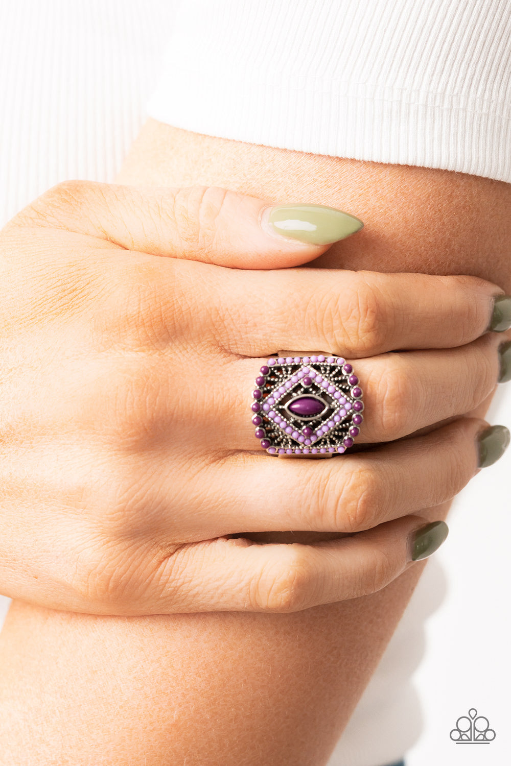 Paparazzi Accessories Amplified Aztec - Purple Dainty purple and plum beads adorn the front of an airy silver frame radiating with studded geometric texture, culminating into a colorful textile inspired pattern atop the finger. Features a stretchy band fo