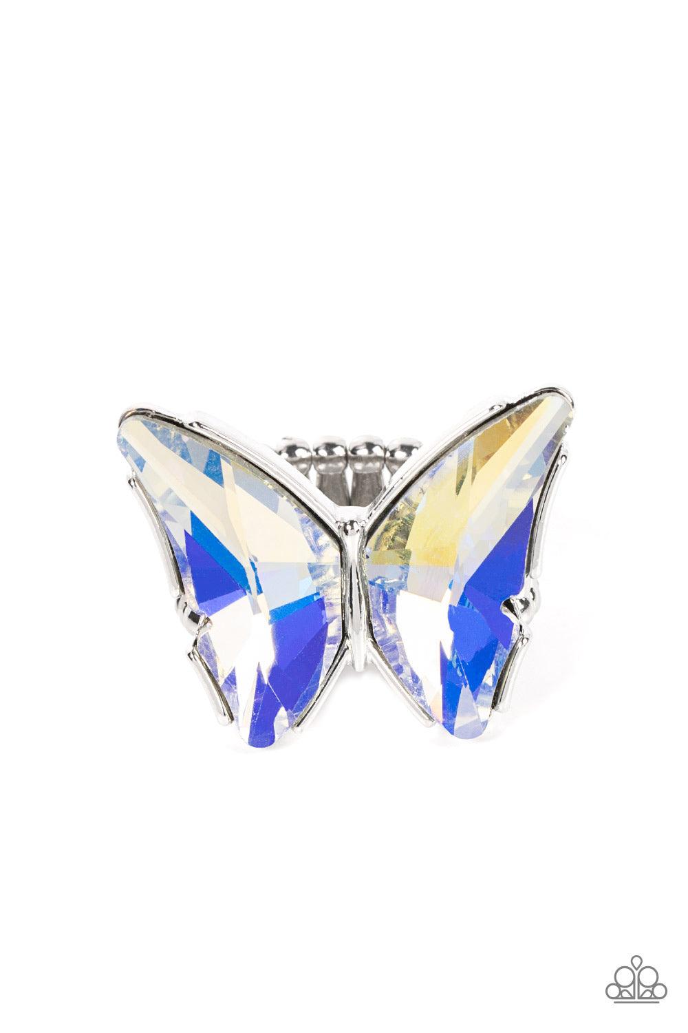 Paparazzi Accessories Fluorescent Flutter - Multi Featuring a stellar UV finish, a pair of iridescent gems adorns the wings of a silver butterfly atop the finger for an eye-catching finish. Features a stretchy band for a flexible fit. Sold as one individu