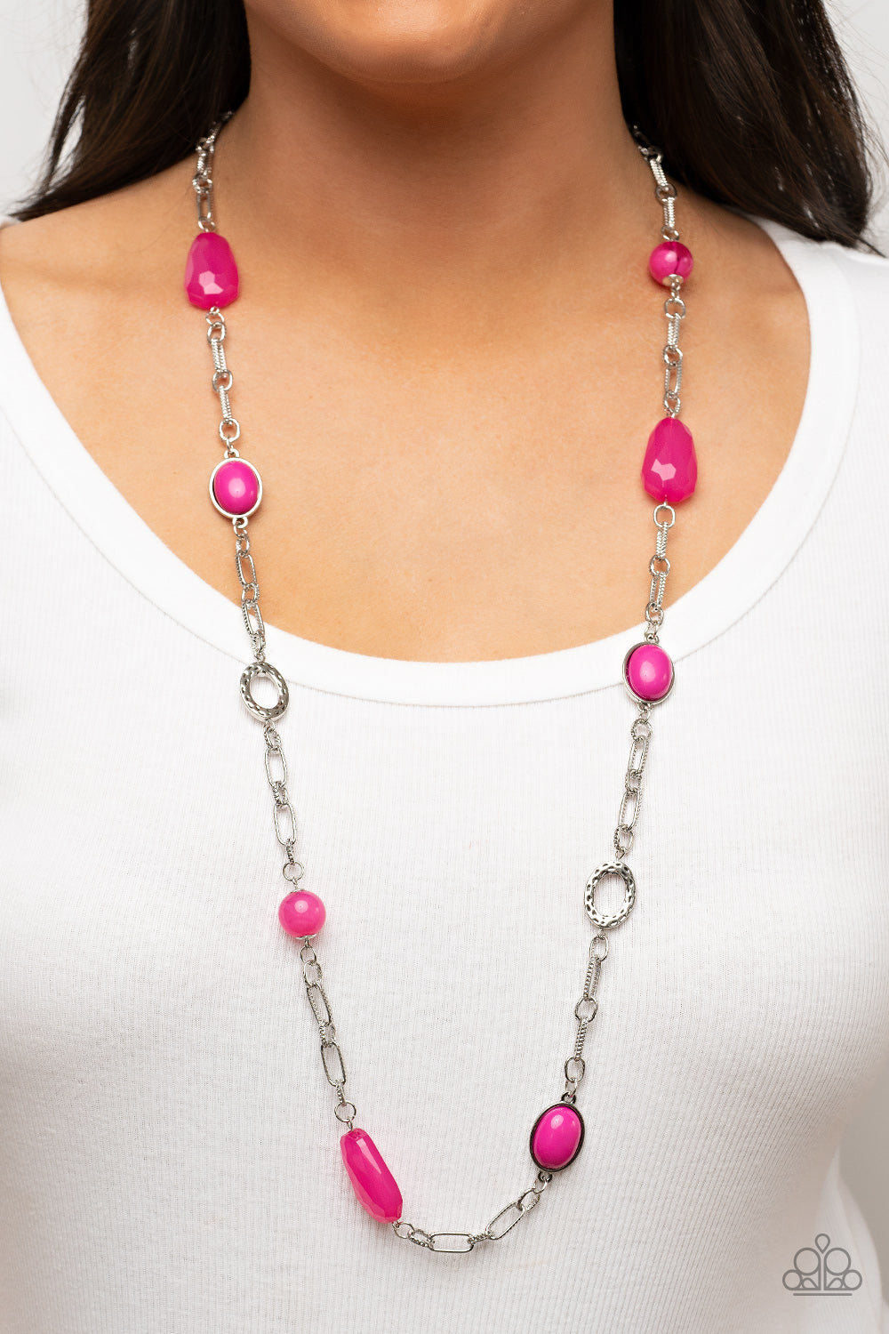 Paparazzi Accessories Barcelona Bash - Pink Featuring acrylic, faceted, and glassy finishes, a refreshing assortment of Fuchsia Fedora beads and gems join hammered silver discs along oversized textured links across the chest for a playful splash of color.