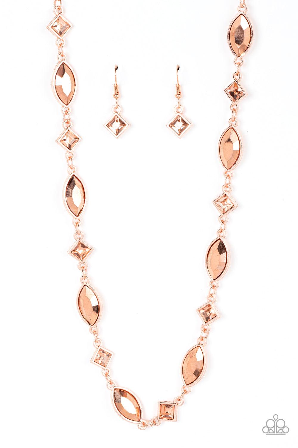 Paparazzi Accessories Prismatic Reinforcements - Copper Encased in shiny copper fittings, a glitzy collection of coppery metallic marquise cut gems and square cut peach rhinestones delicately links below the collar for a prismatic pop of color. Features a