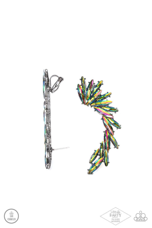 Paparazzi Accessories Because ICE Said So - Multi An explosion of marquise cut oil spill rhinestones delicately climb the ear, coalescing into a smoldering frame. Earring attaches to a standard post fitting. Features a clip-on fitting at the top for a sec
