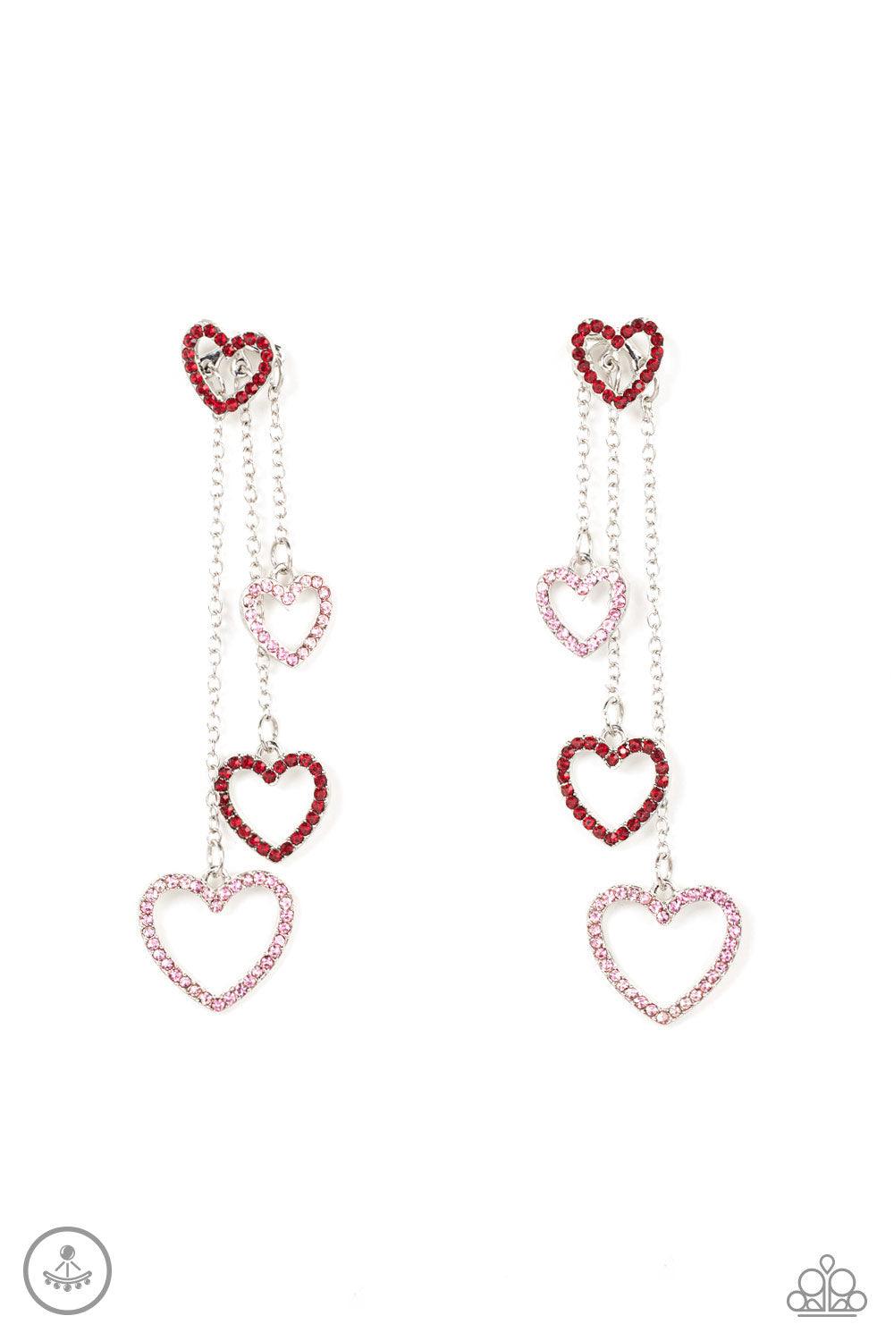 Paparazzi Accessories Falling In Love - Multi Encrusted in dainty red rhinestones, a glittery silver heart fitting attaches to a double-sided post designed to fasten behind the ear. Attached to dainty silver chains of varying lengths, a glittery collectio