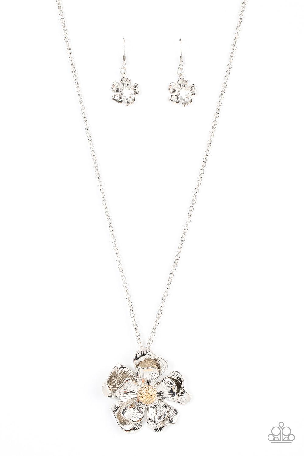 Paparazzi Accessories Homegrown Glamour - Silver Layers of scalloped and textured silver petals bloom from a studded gold beaded center. The oversized flower swings from the bottom of an extended silver chain, resulting in an eye-catching floral pendant.