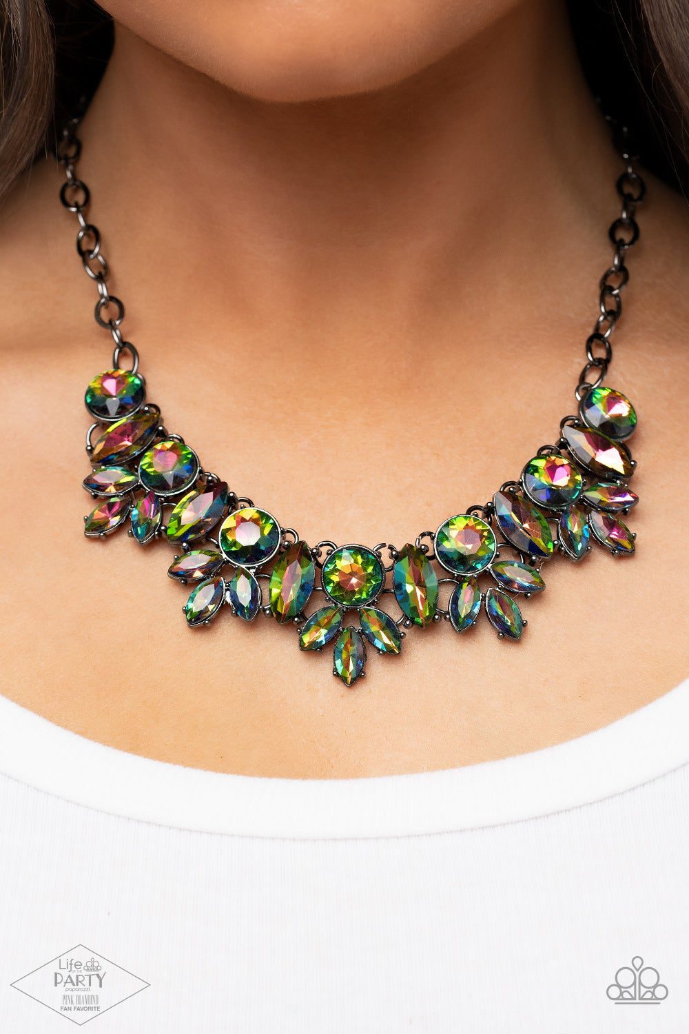Paparazzi Accessories Combustible Charisma - Multi A blinding series of oversized round and marquise style oil spill rhinestones dramatically link below the collar, creating a show-stopping statement piece. Features an adjustable clasp closure. Sold as on