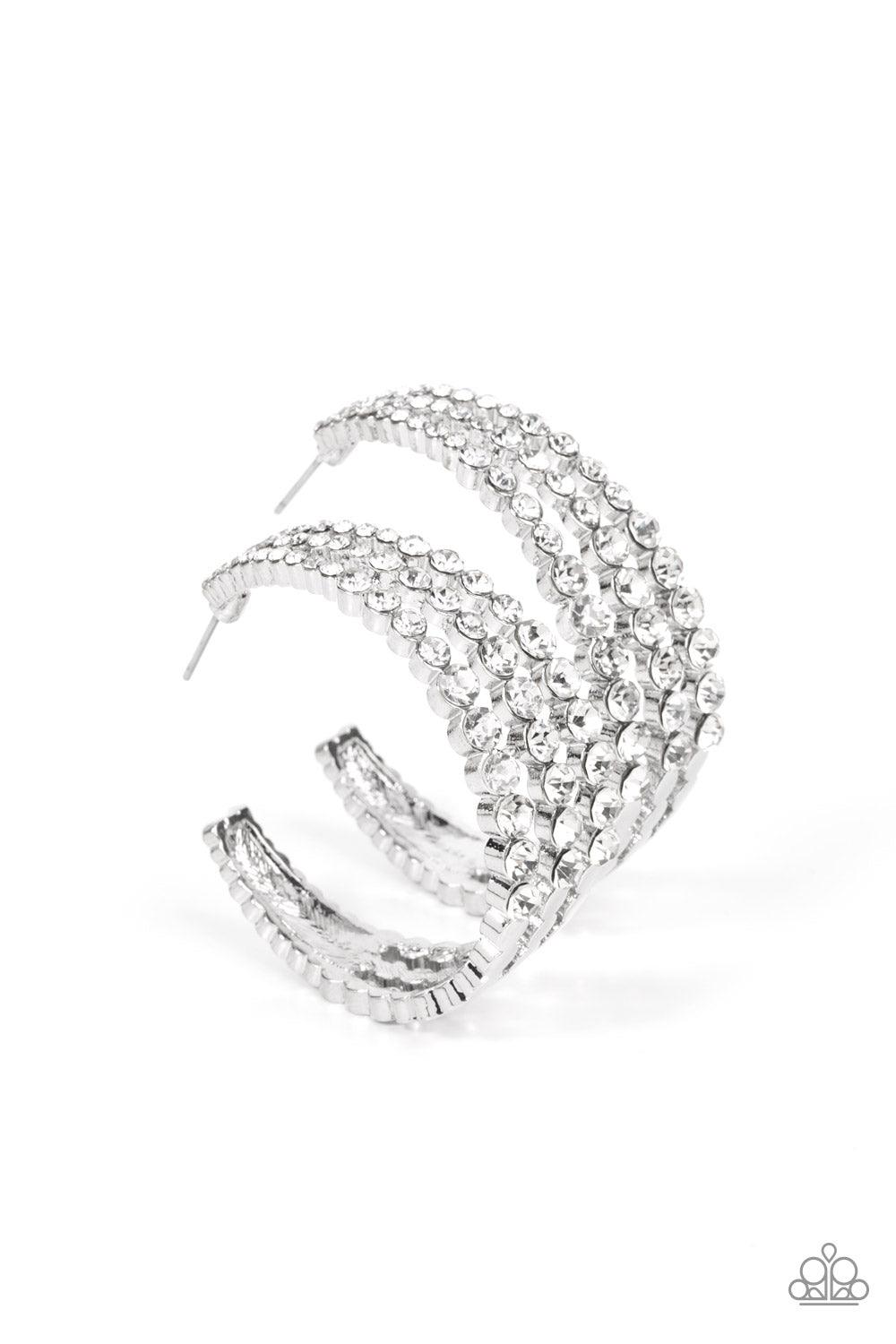 Paparazzi Accessories Cosmopolitan Cool - White Cascading layers of sparkling white rhinestones plunge into flattened silver plates creating a stunning eye-catching hoop earring. Earring attaches to a standard post fitting. Hoop measures approximately 2"